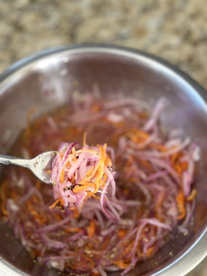 close up of xnipec salsa showing all of the ingredients.